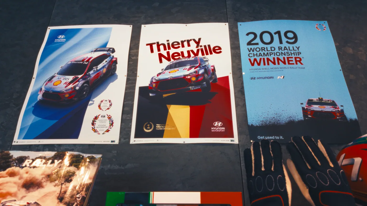 Rally racing posters and memorabilia photographed up close